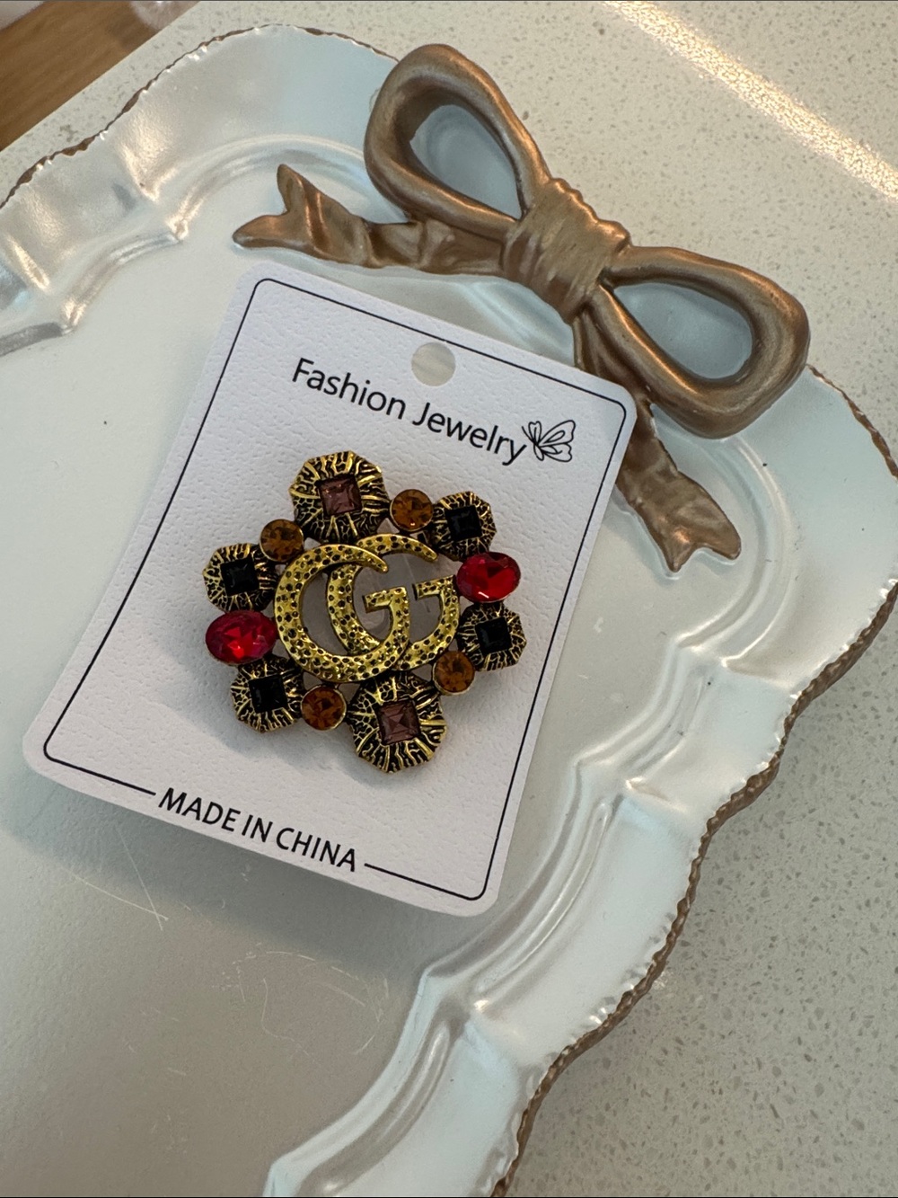 5/22 Fashion Jewelry Gold-Tone Floral Logo Brooch